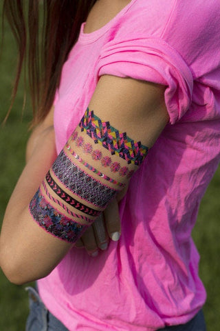 Friendship Bracelet Temporary Tattoo Neon Glow under Black Light Festival and Club. Colorful and Fun. Geometric shapes